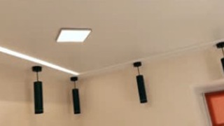 Потолок со световыми линиями и подвесными светильниками 